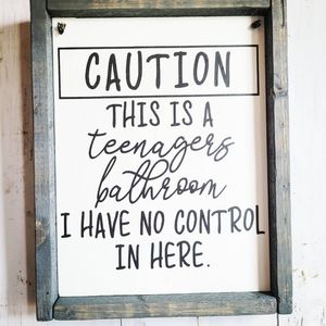 Teenager bathroom sign